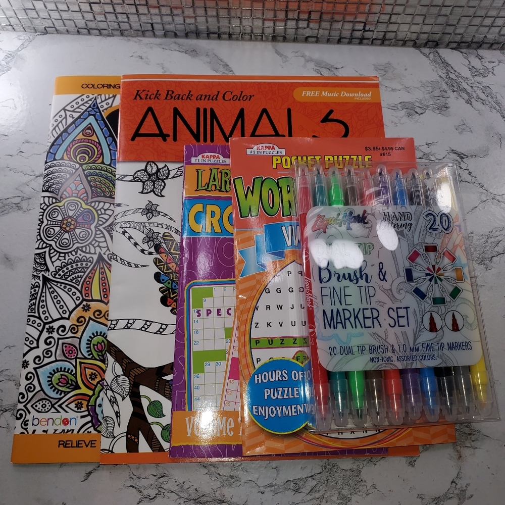 Puzzle books, adult coloring books and markers
